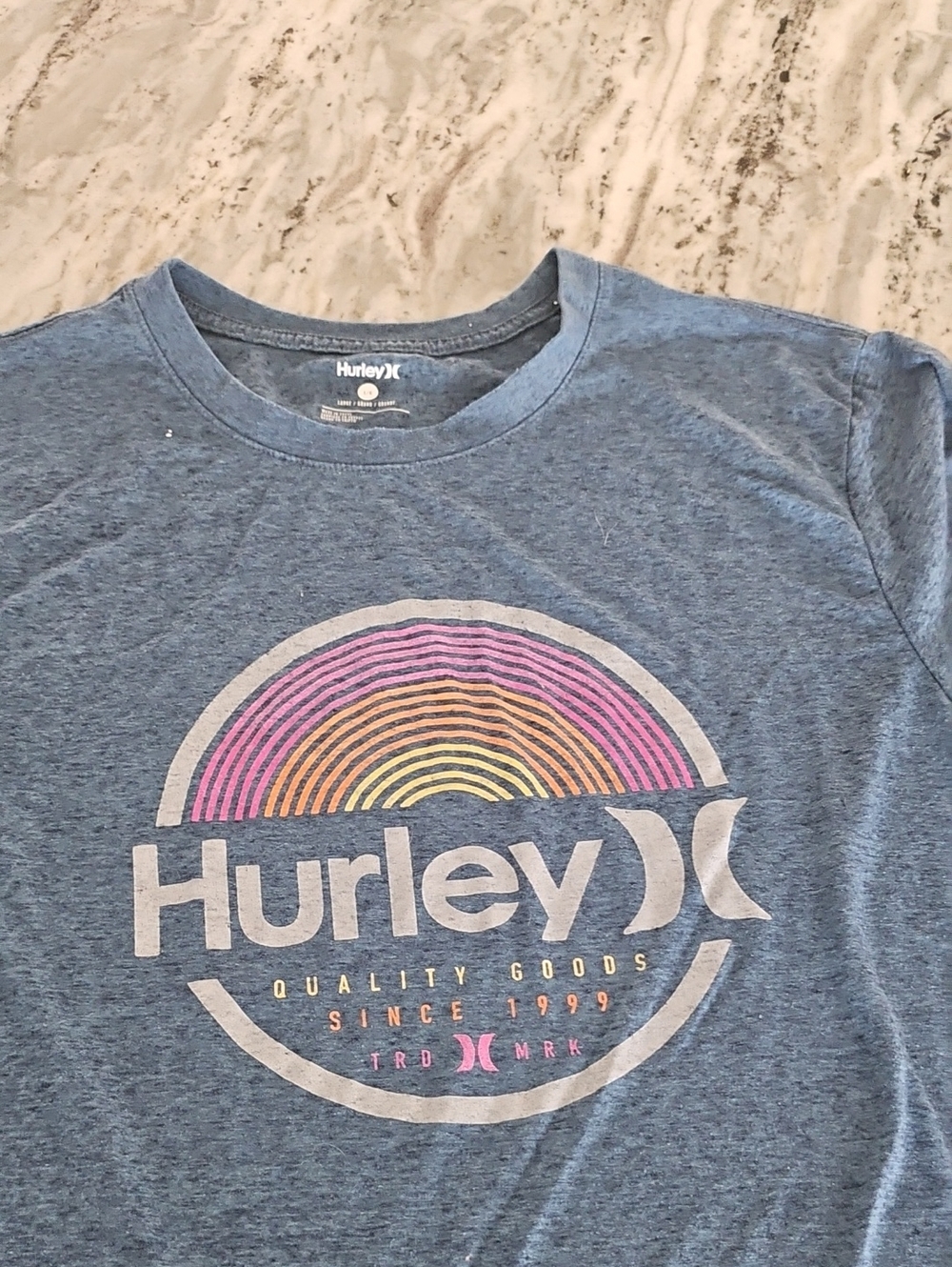 Hurley Blue Tee with Pastel Rainbow Logo